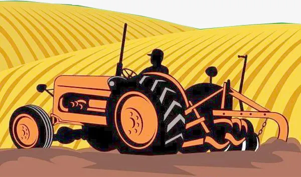 黄色麦地里开着机械车耕作的现代免抠