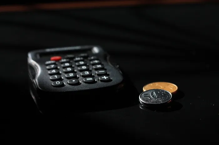 黑色，旁边，两个，圆形硬币，会计，财务，硬币，计算器