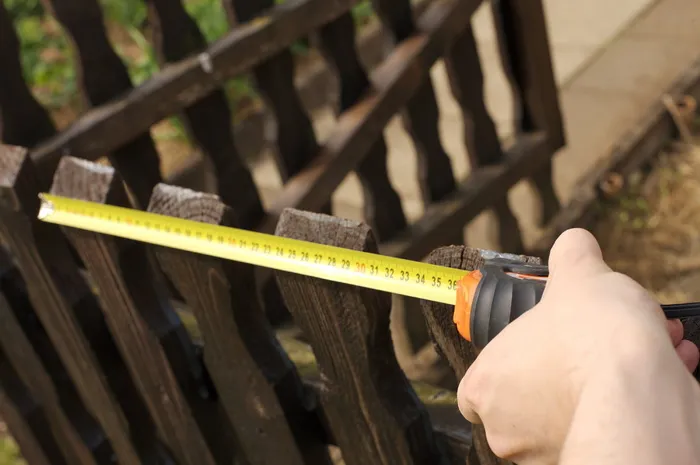 人员测量围栏，卷尺，测量，米，长度，厘米，卷尺，距离