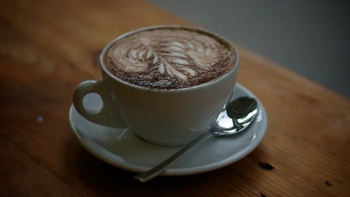 咖啡,饮料/饮品,咖啡/可可饮料-卡布奇诺咖啡饮料,拉花,咖啡杯碟,咖啡与社会事务系