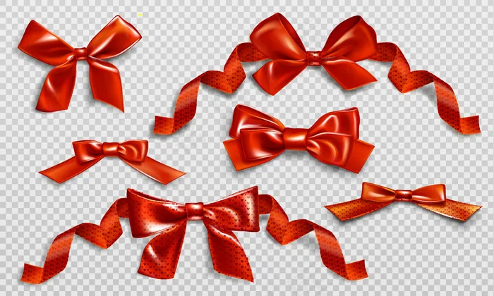 红色蝴蝶结，带有卷曲的丝带和心形图案。