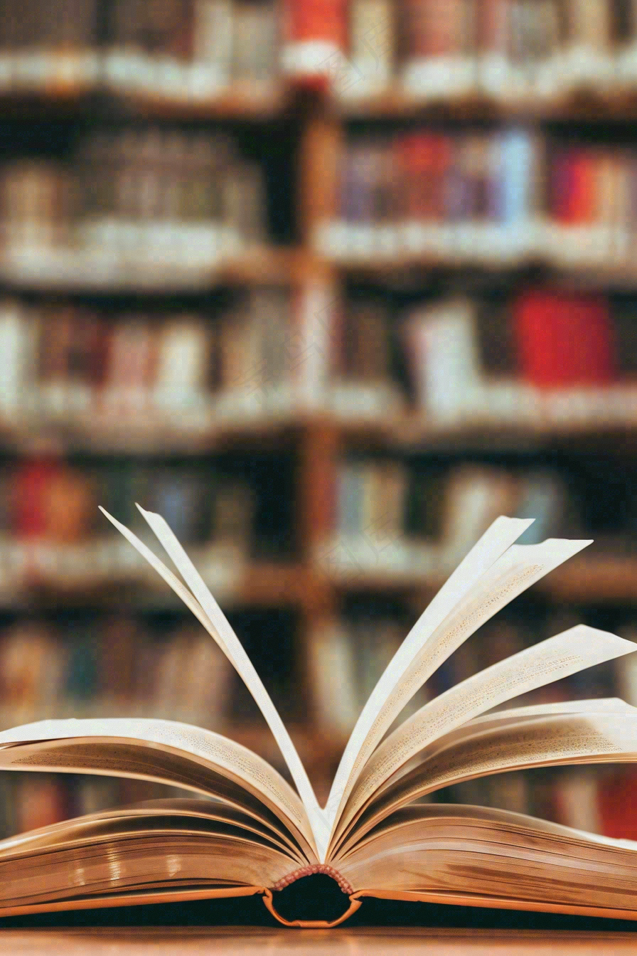 图书馆翻开的书本知识阅读教师节摄影图