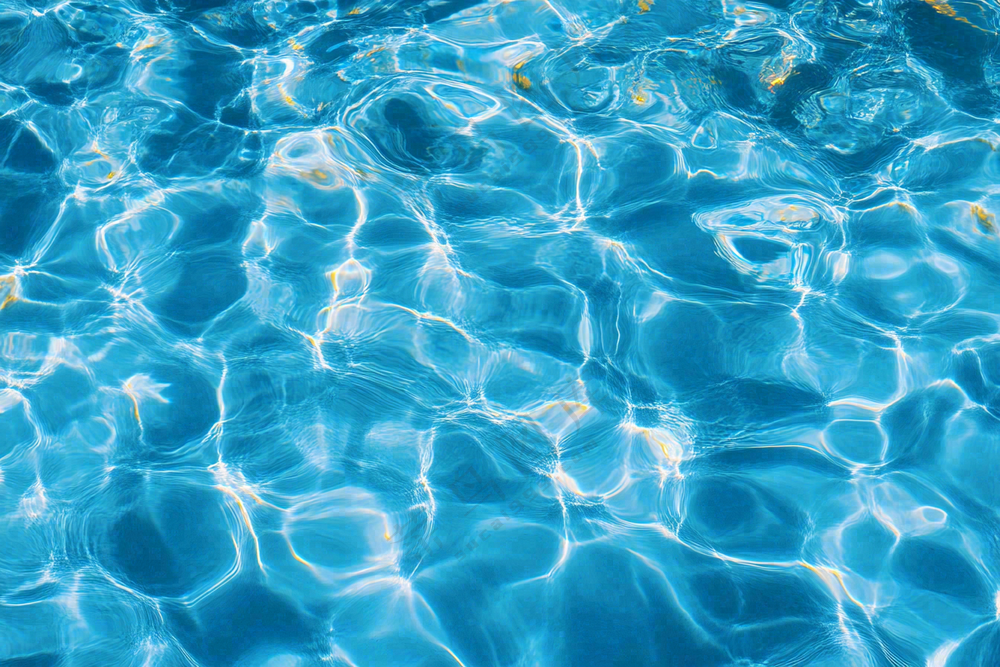 蓝色的游泳池水池摄影图