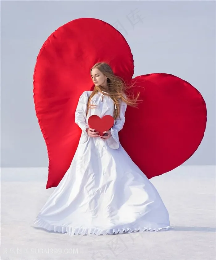 爱心与穿白色裙子的女性