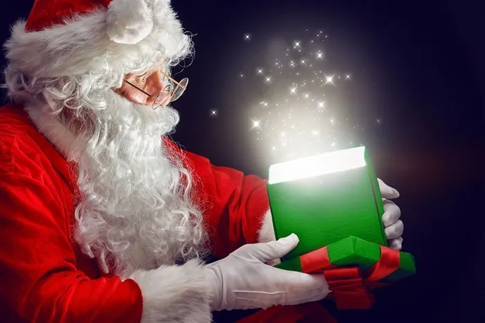 打开礼盒的圣诞老人高清图片