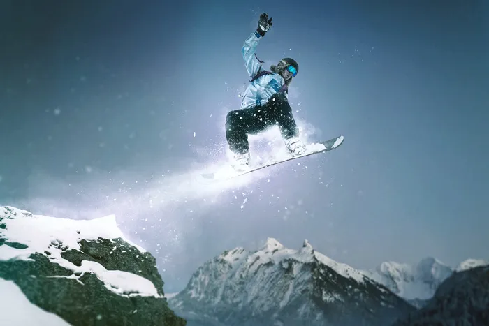 冬天跳跃滑雪的人物高清图片
