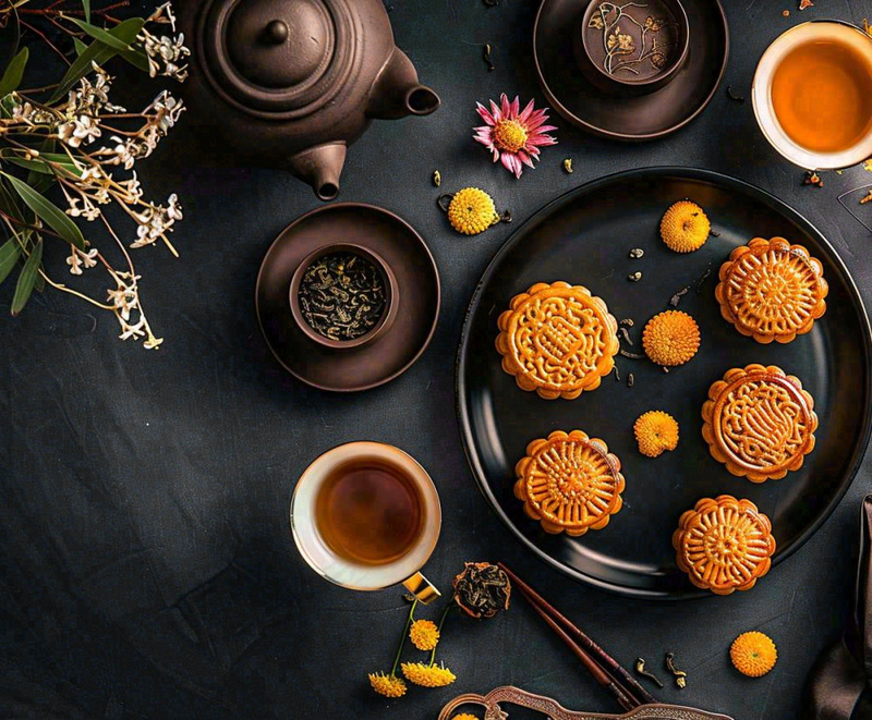 中秋美食月饼中国传统糕点摆盘装饰泡茶摄影图